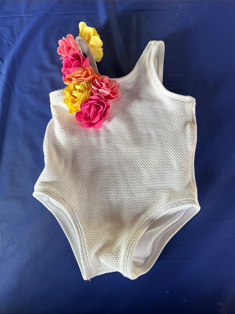 White One-Piece Girls' Swimsuit with Pink & Yellow Floral Shoulder Accent